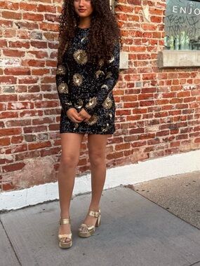 Show Me Your MuMu Black Sequin Mini Dress with Gold Sunburst Motif